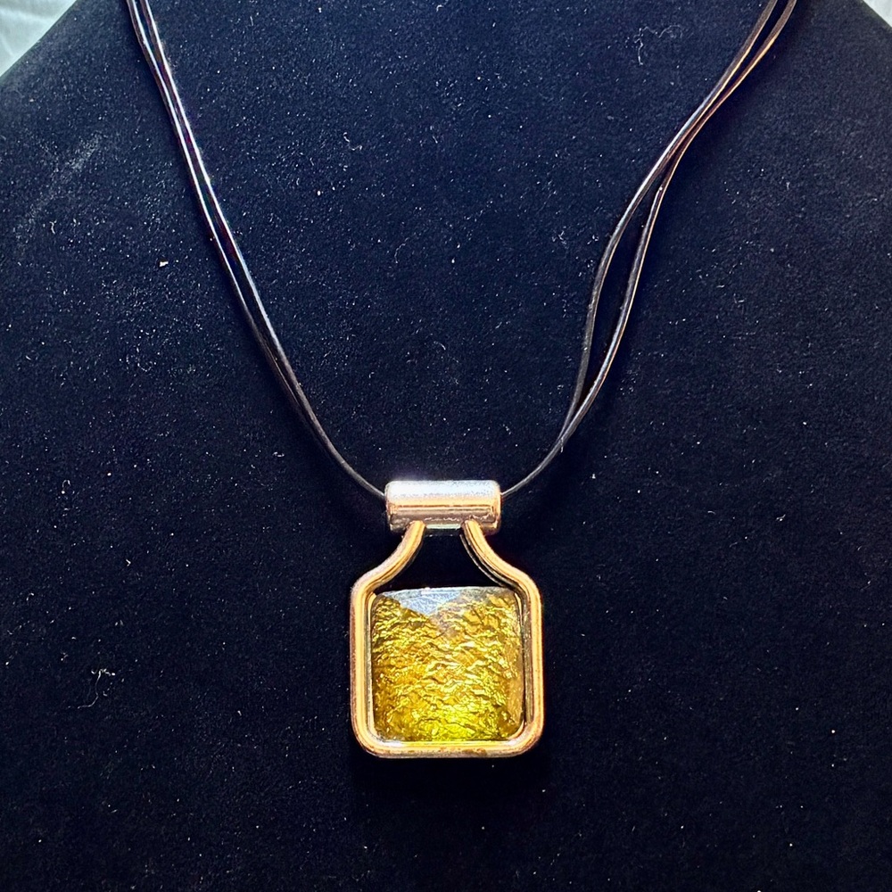 Vintage Like Faux Peridot in a Bezel Silver Tone Pendant on a Black Plastic Rope
